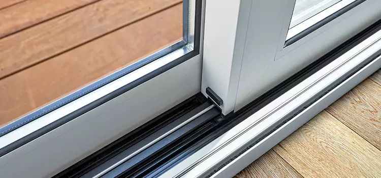 Why Your Sliding Door Keeps Getting Stuck in Holtsville, NY?